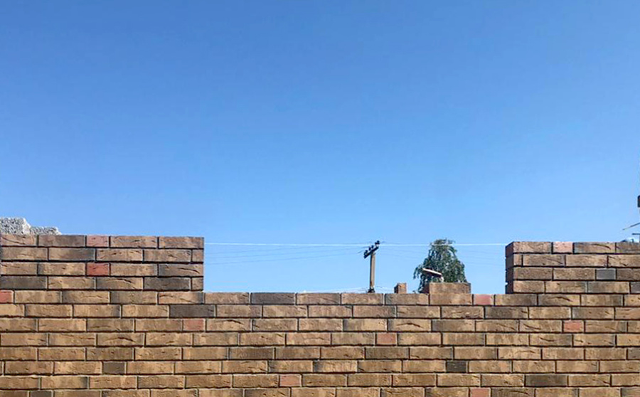 Фото Облицовочный фигурный кирпич Konigstein Марксбург Серый полнотелый 250*120*65 мм